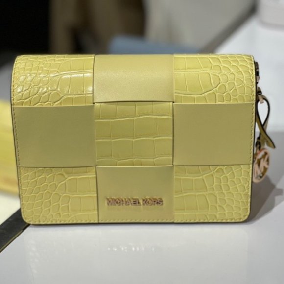 MK Mercer Clutch Leather Crossbody Buttercup - Picture 1 of 7